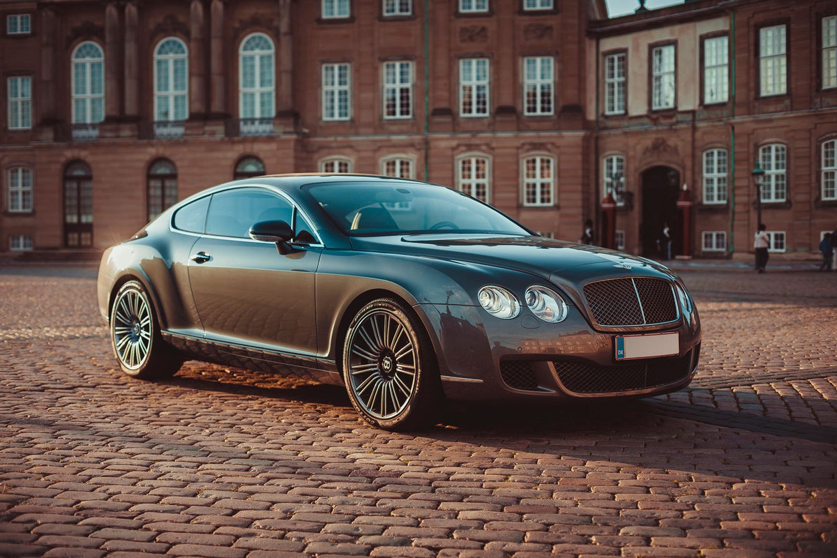 Bentley Continental GT on a cobblestone street